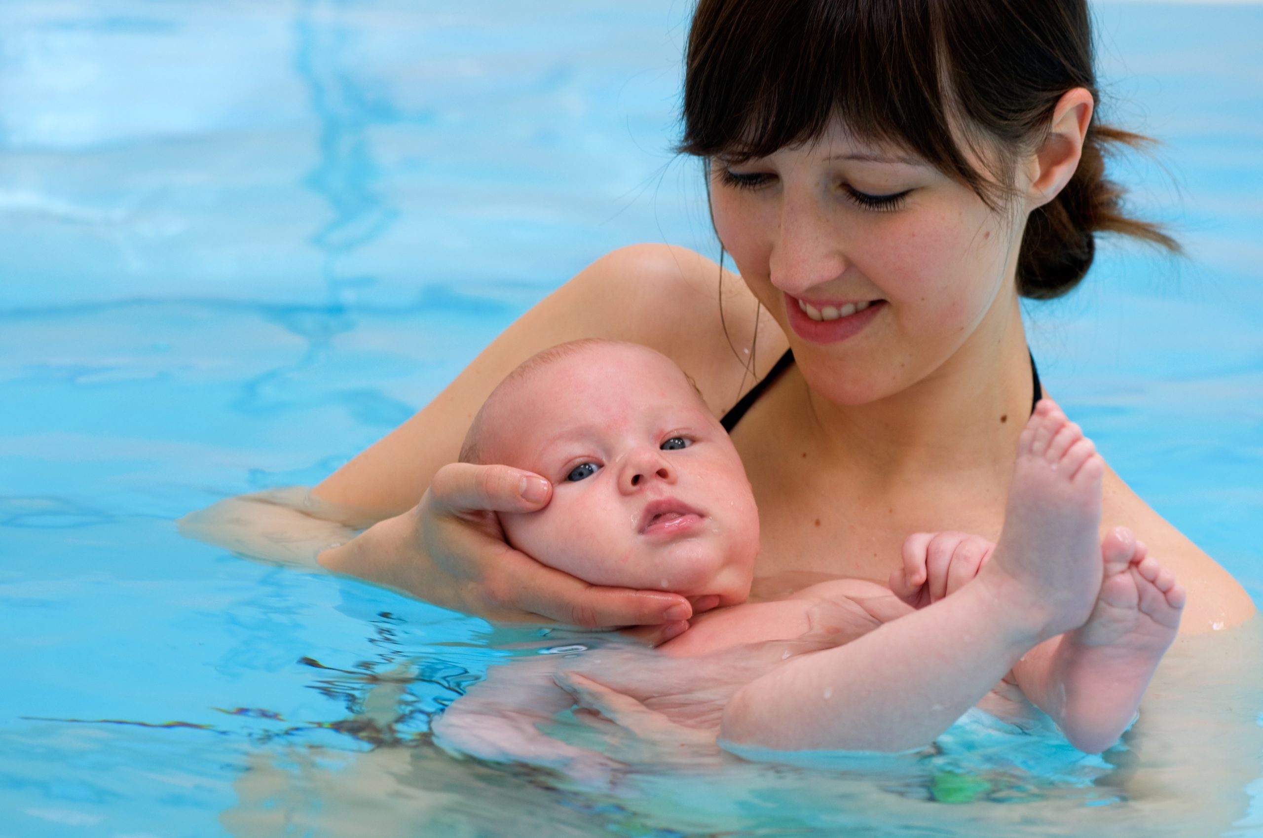 Baby,Having,Swimming,Lesson,With,Mother